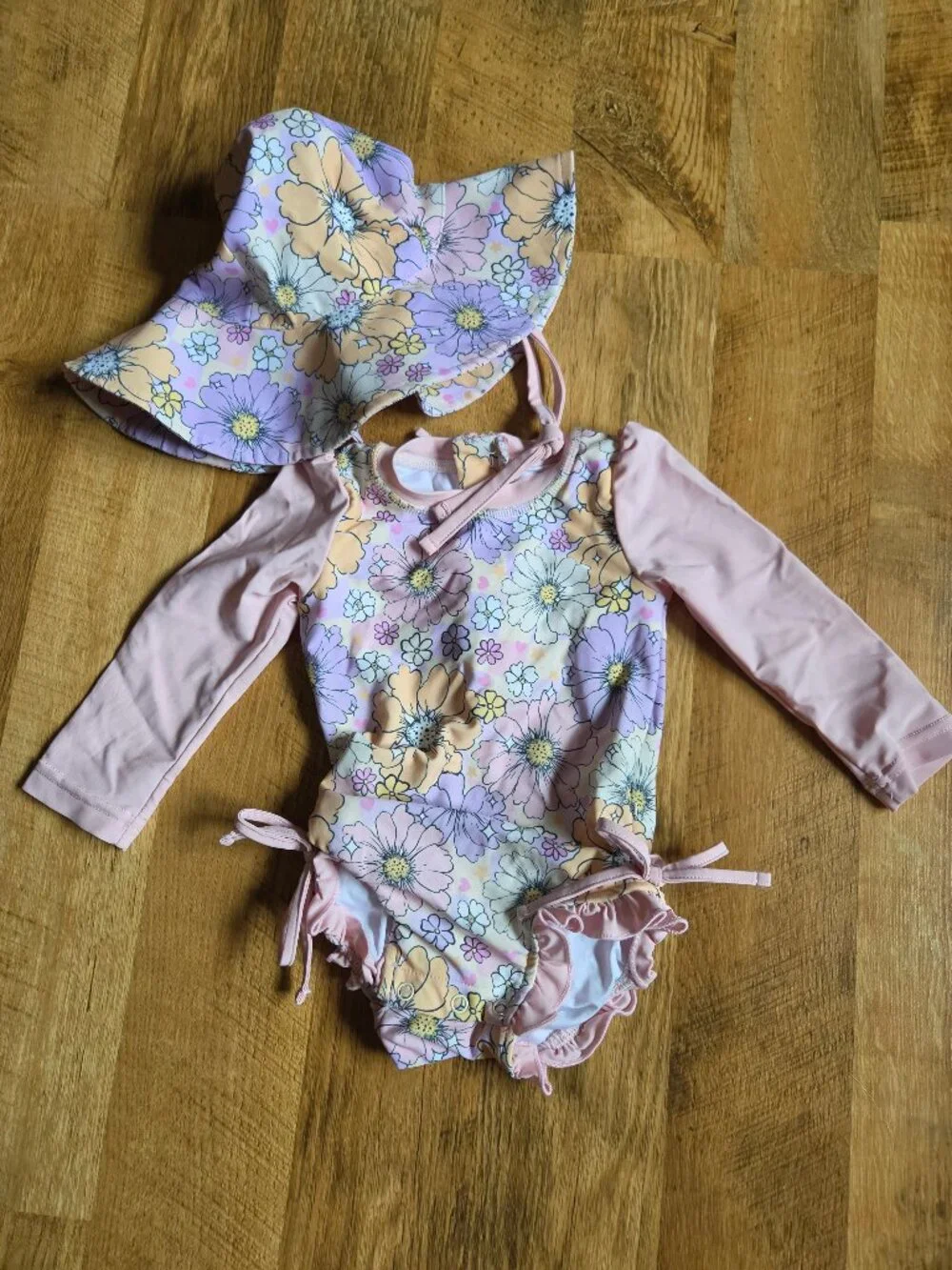 Caden Lane Long Sleeve Rash Guard With Ruffle Bottom and Printed Sun Hat